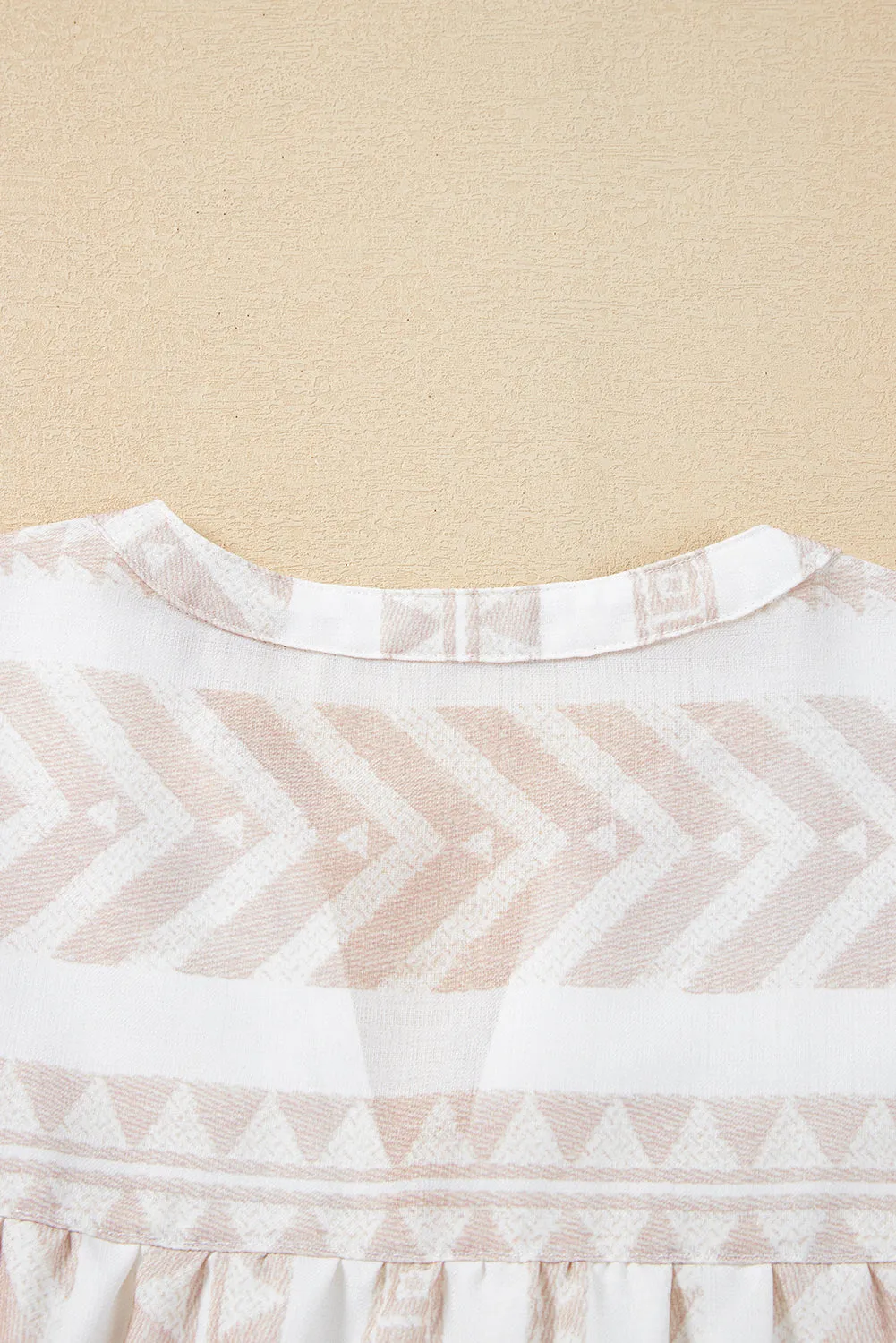 Jet Stream Geometric Jacquard Split V Neck Short Sleeve Blouse